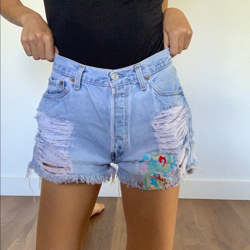 Distressed Levi 501 cutoffs